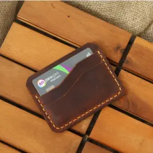 Full grain leather card holder in minimalist style, handmade in original leather.